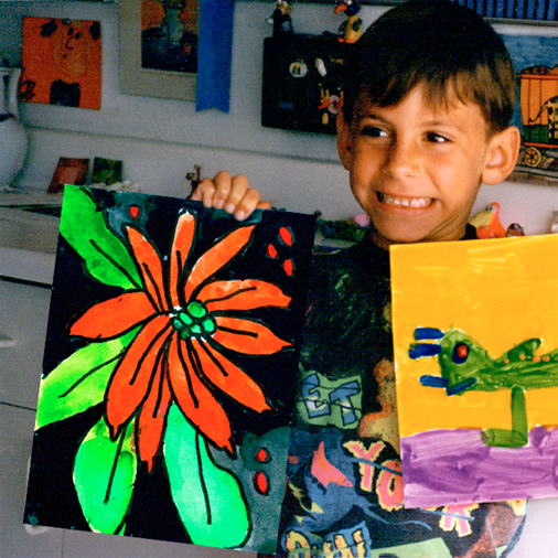Christopher Bowerman Age 7 holding original watercolor Pointsettia
